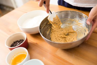 mixing-dough-in-bowl-by