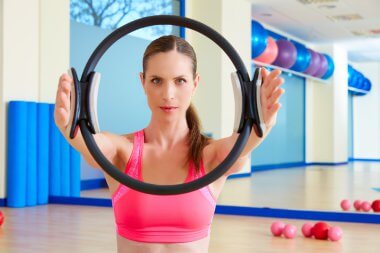 depositphotos 82414474 stock photo pilates woman magic ring hands